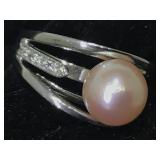 Sterling silver ring with pearl and clear