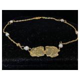 14K Gold Bracelet with people design 
4.5 inches
