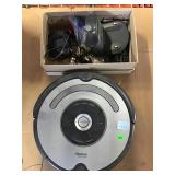 I robot Roomba with docking station remote and