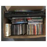 Sony CD DVD player with CDs and DVDs