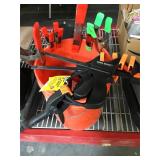 Bucket of assorted clamps