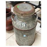 Vintage metal milk jug, approx 24 inches tall