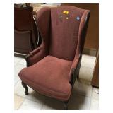 Wood armchair w/studded accents and tall back