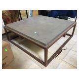 Stone top coffee table with metal frame, approx