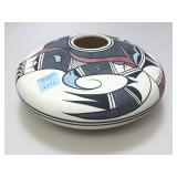 Signed Native pottery.