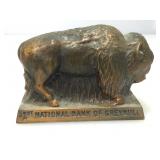 Metal buffalo penny bank.