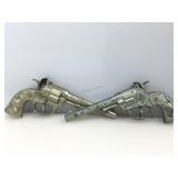 Pair of vintage Star cap guns.