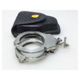 The Peerless Handcuff co handcuff with leather