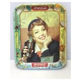 Coca Cola advert tray. Thirst knows no season.