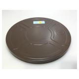 Vintage film reel in metal storage case.