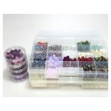 Assorted Beads in containers.