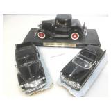 Die cast model cars and truck. On stands. From