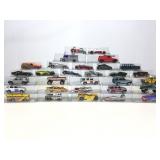 30 Assorted Die Cast Cars. In plastic display