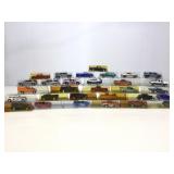 30 Assorted Die Cast Cars. In plastic display
