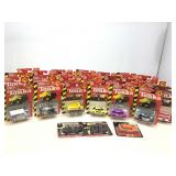 30 Assorted Die Cast Cars. In plastic display