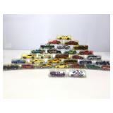 30 Assorted Die Cast Cars. In plastic display