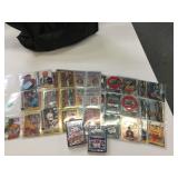 Racing cards in pages with baseball card decks