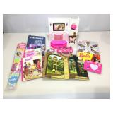 Collection of Barbie related items.