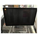 Sony 23 inch TV on metal stands