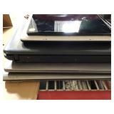 Stack of laptops and tablet