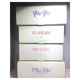 Assorted porcelain dolls.