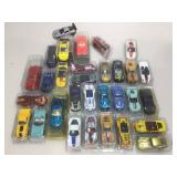 Assorted die cast cars.