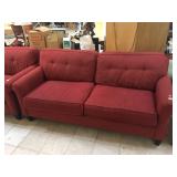 Red couch, approx 7 ft long