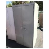 Metal cabinet with shelves - approx. 6.5 ft tall