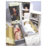 Assorted porcelain dolls.