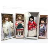 Assorted porcelain dolls.