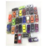Assorted die cast cars.