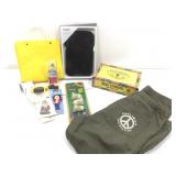 Cigar box with assorted doll brushes and more.