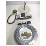 Assorted toy cars Collectible plates and more.