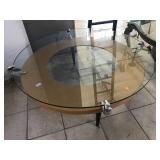 Glass coffee table with wood base and metal