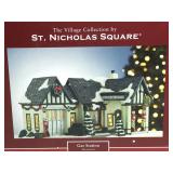 Illuminated St Nicholas Square village piece. Gas