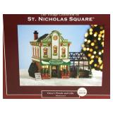 Illuminated St Nicholas Square village piece.