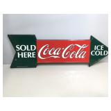 Coca Cola arrow shaped metal sign. 9x27 in.