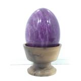 Marble style egg on wooden stand. Approx 6x4.