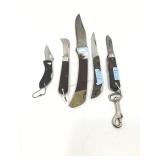 Assorted folding knives.