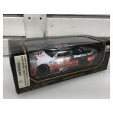 1:24 scale die cast Nascar bank with key in box.