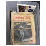 Bin full of vintage programs and sports items