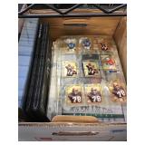 Box full of sports cards in albums and pages