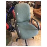 Rolling green office chair, missing one wheel