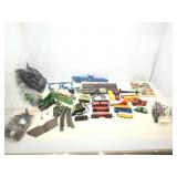 collection of model train items. Cars, tracks and