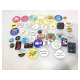Assorted flair pins and more.