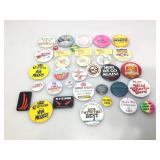 Assorted flair pins and more.