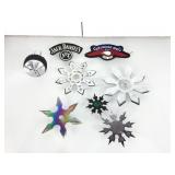 Assorted throwing knives stars and more.