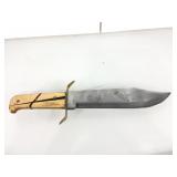 Large blade knife with sheath.