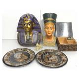 Egyptian style busts, metal plates and more.