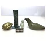 Stone and brass decor items.